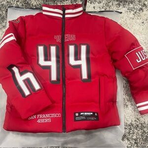 Unisex Kyle Juszczyk Scarlet San Francisco 49ers Off Season x NFL Puffer Jacket